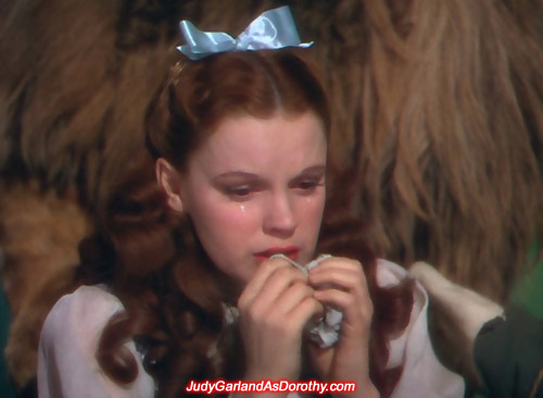 Judy Garland as Dorothy crying at the Emerald City