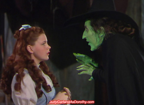 Judy Garland as Dorothy is confronted by the mean Wicked Witch of the West