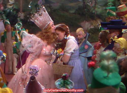 Judy Garland as Dorothy receives a good luck kiss from Glinda