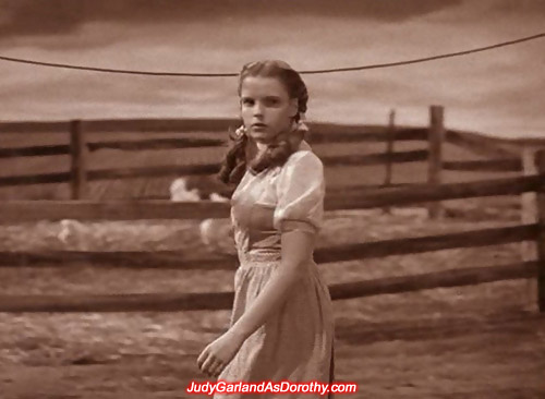 Judy Garland as Dorothy taking a stroll on her Kansas farm