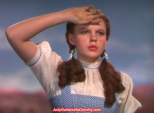 Stunning beauty Judy Garland as Dorothy does the salute